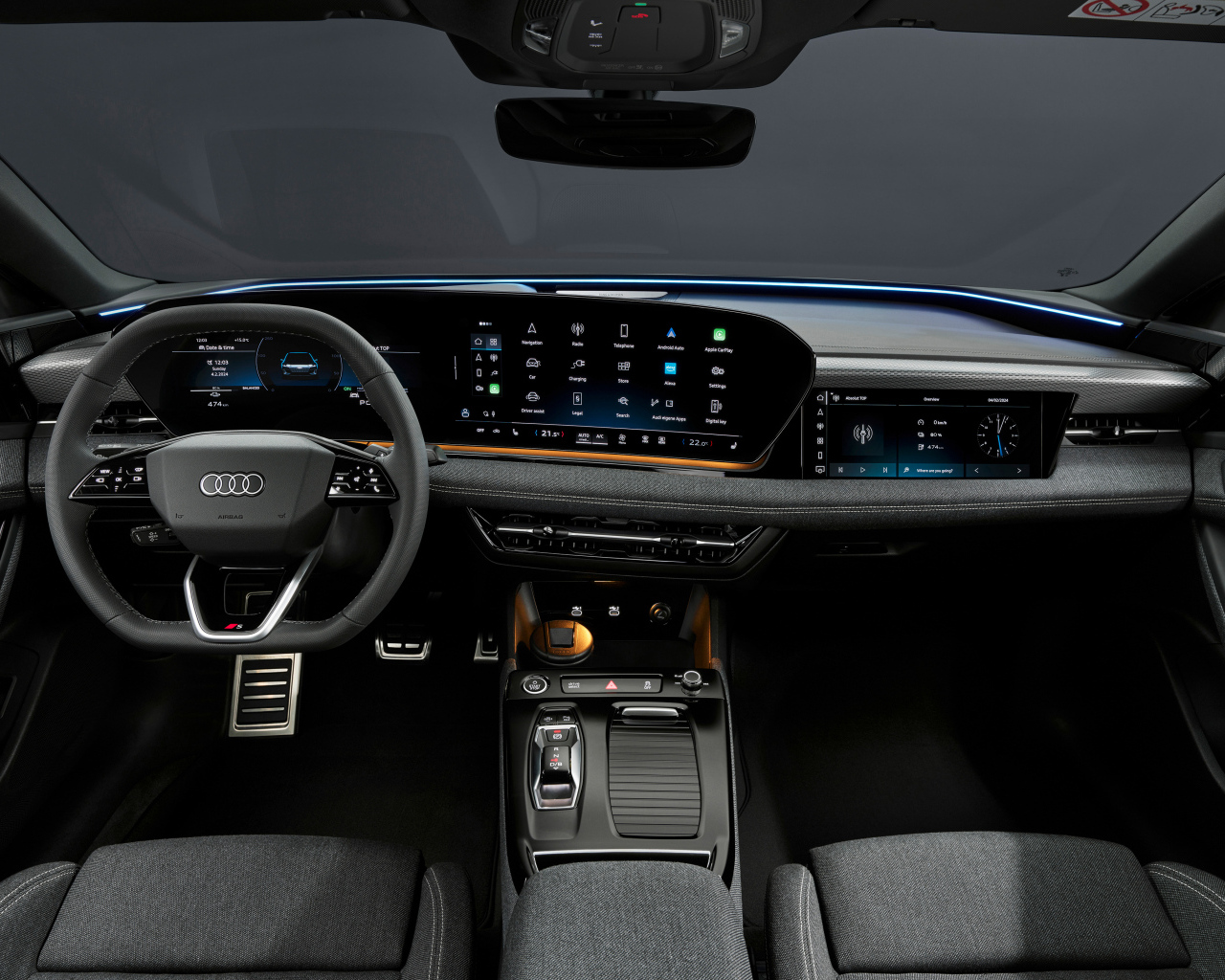 Черный салон автомобиля Audi A6 Sportback e-tron performance 2024 года