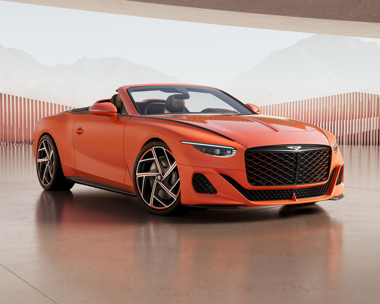 Красный автомобиль Bentley Mulliner Batur Convertible 2024 года