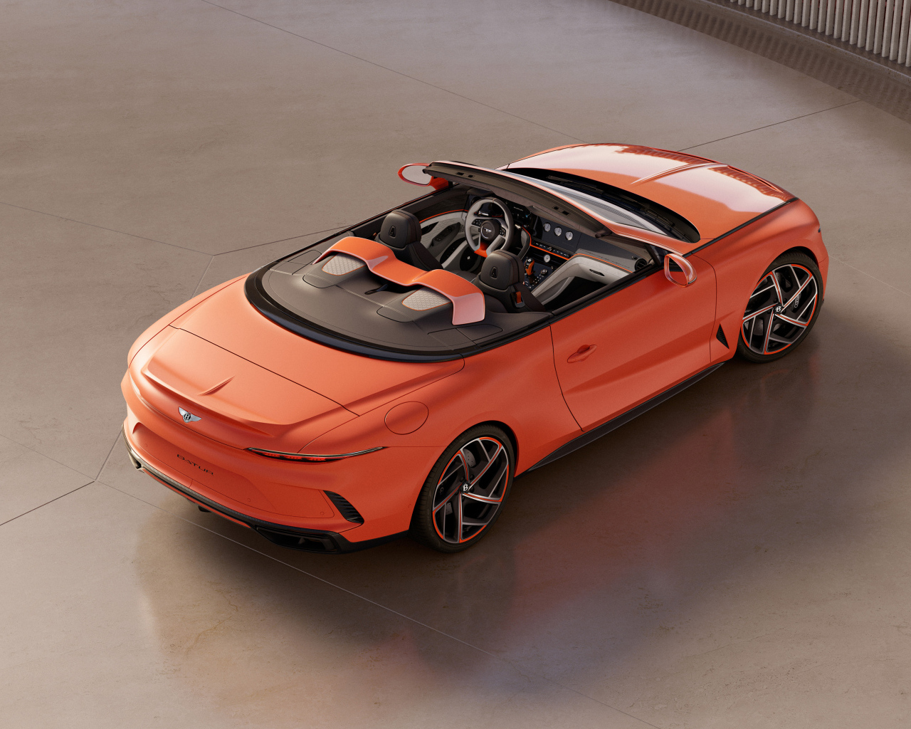 Красный автомобиль Bentley Mulliner Batur Convertible 2024 года вид сверху