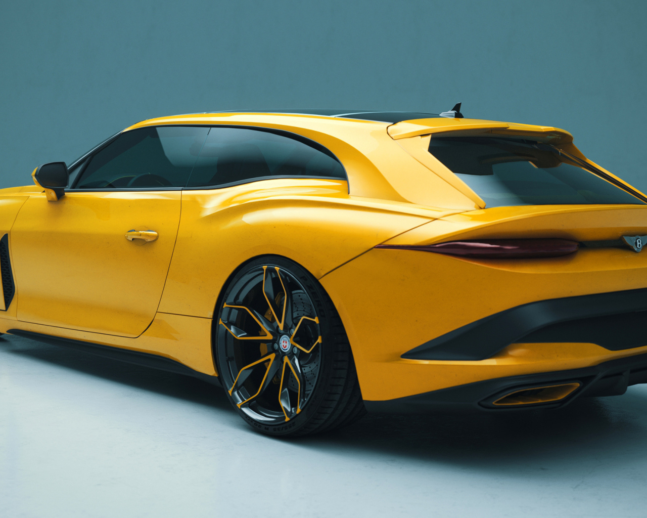 Желтый автомобиль Bentley Mulliner Bacalar вид сзади