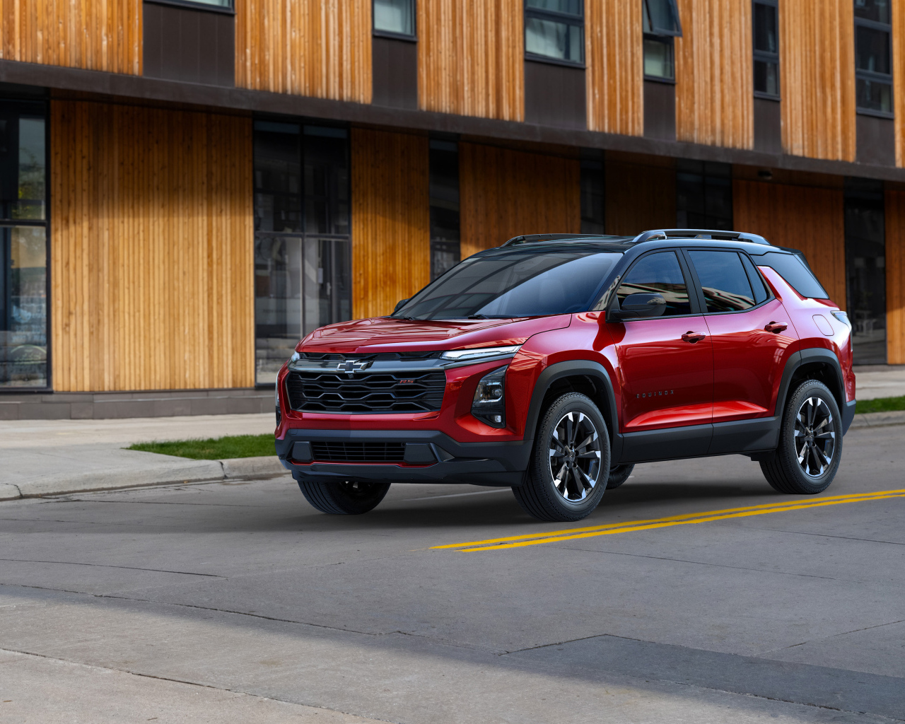 Красный автомобиль Chevrolet Equinox RS 2025 года