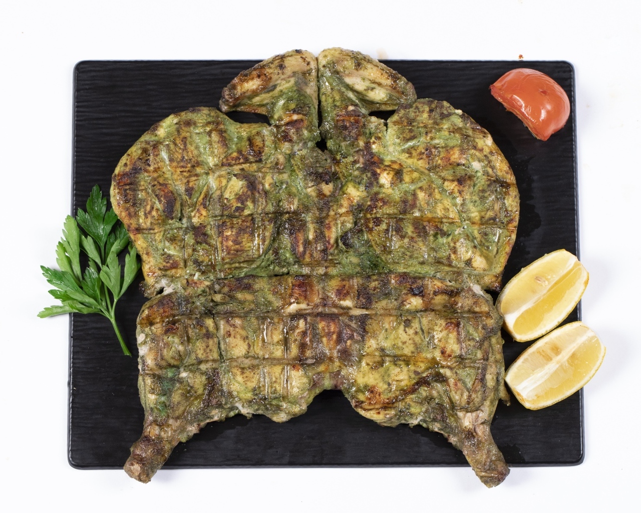 Цыпленок табака на тарелке