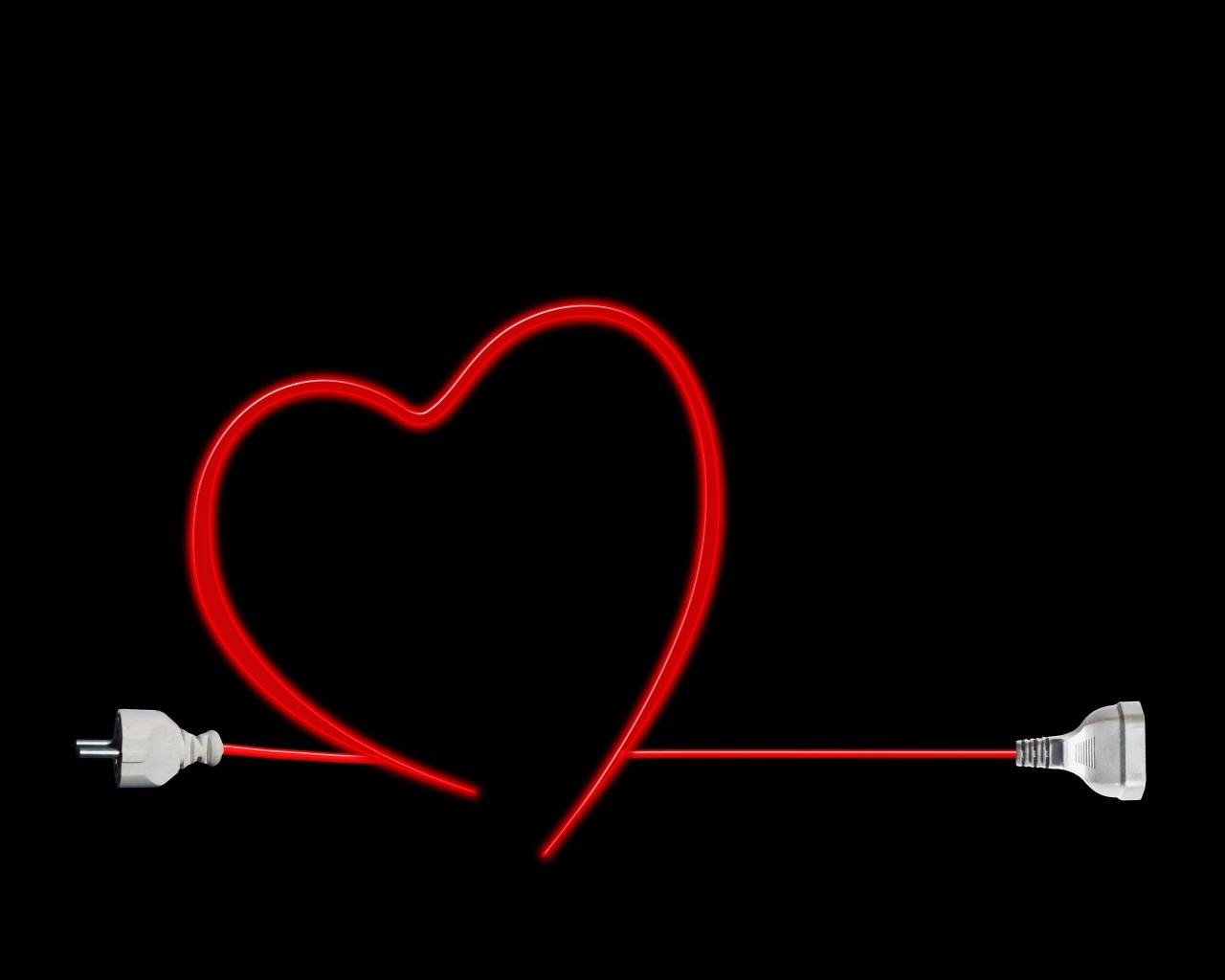 Красное сердце из провода на черном фоне