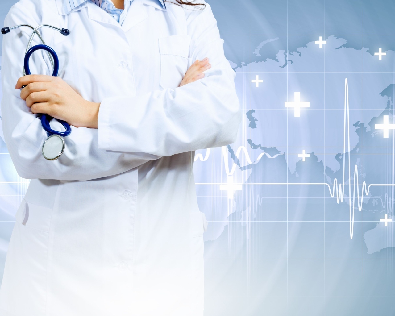 Врач в белом халате со стетоскопом в руках