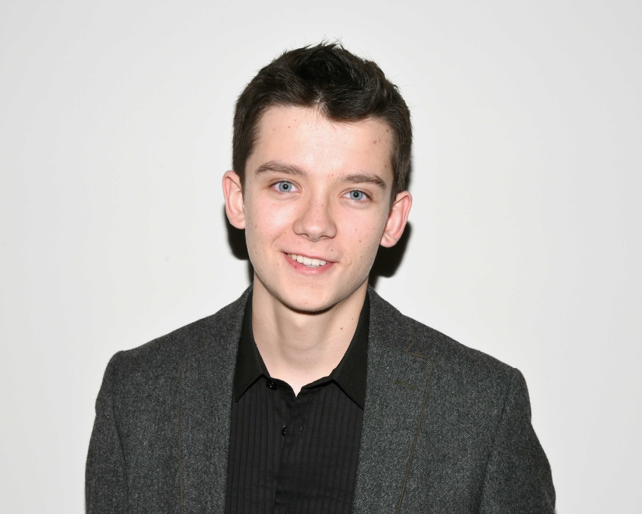 Молодой голубоглазый актер Эйса Баттерфилд