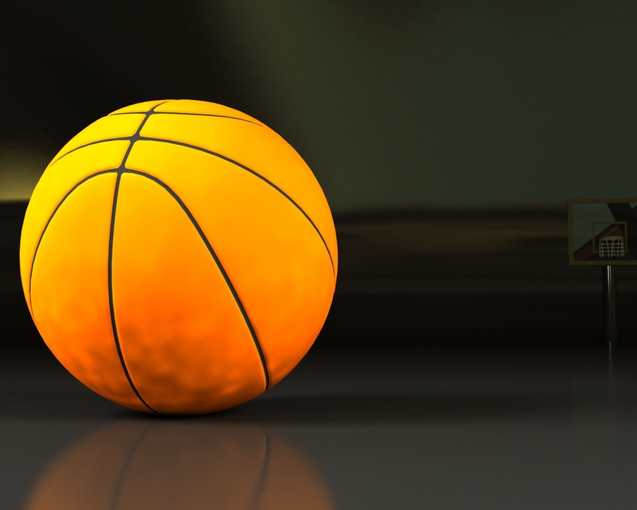 Большой оранжевый мяч на сером фоне