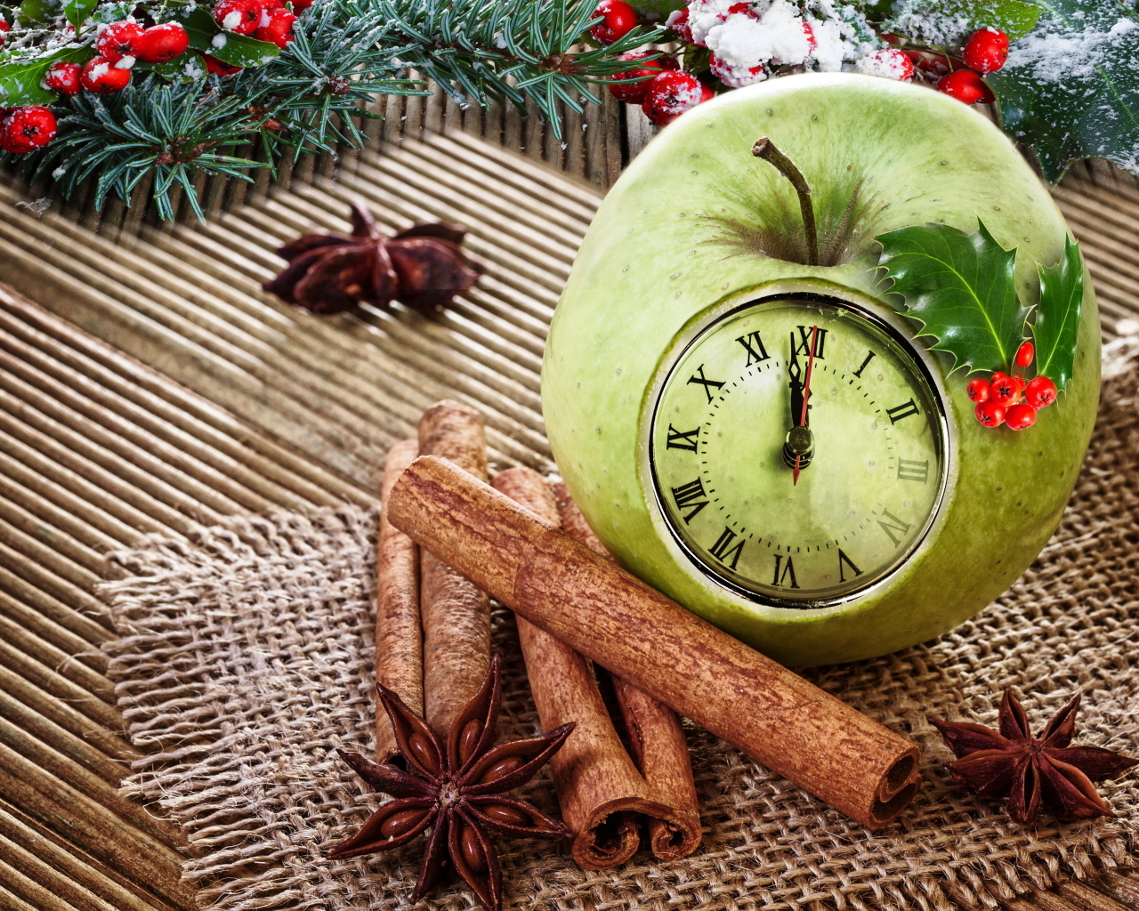 Зеленое яблоко с часами на столе со специями