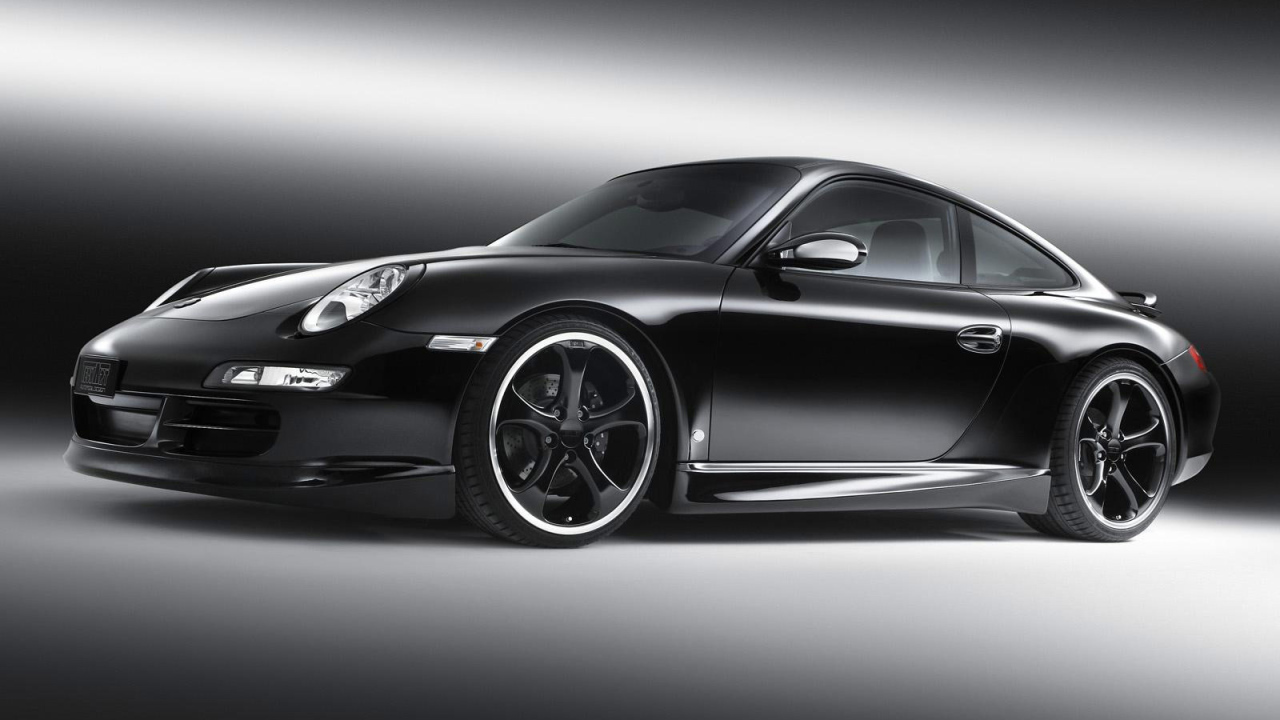 Черный Порше с черными литыми дисками