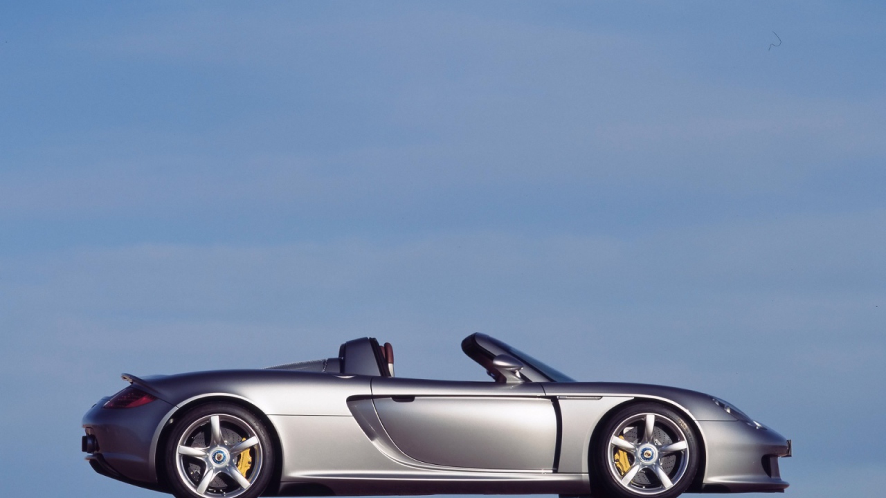 Серебрянный Порш Каррера