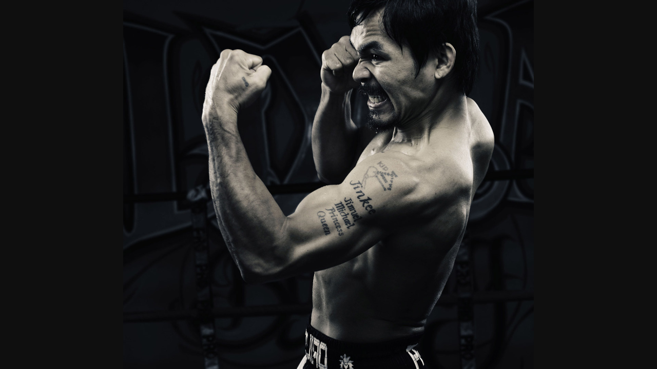 Фотография боксера во время апперкота
