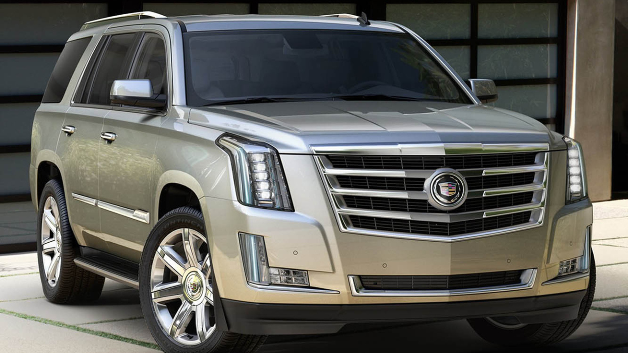 Золотистый Cadillac Escalade 2014