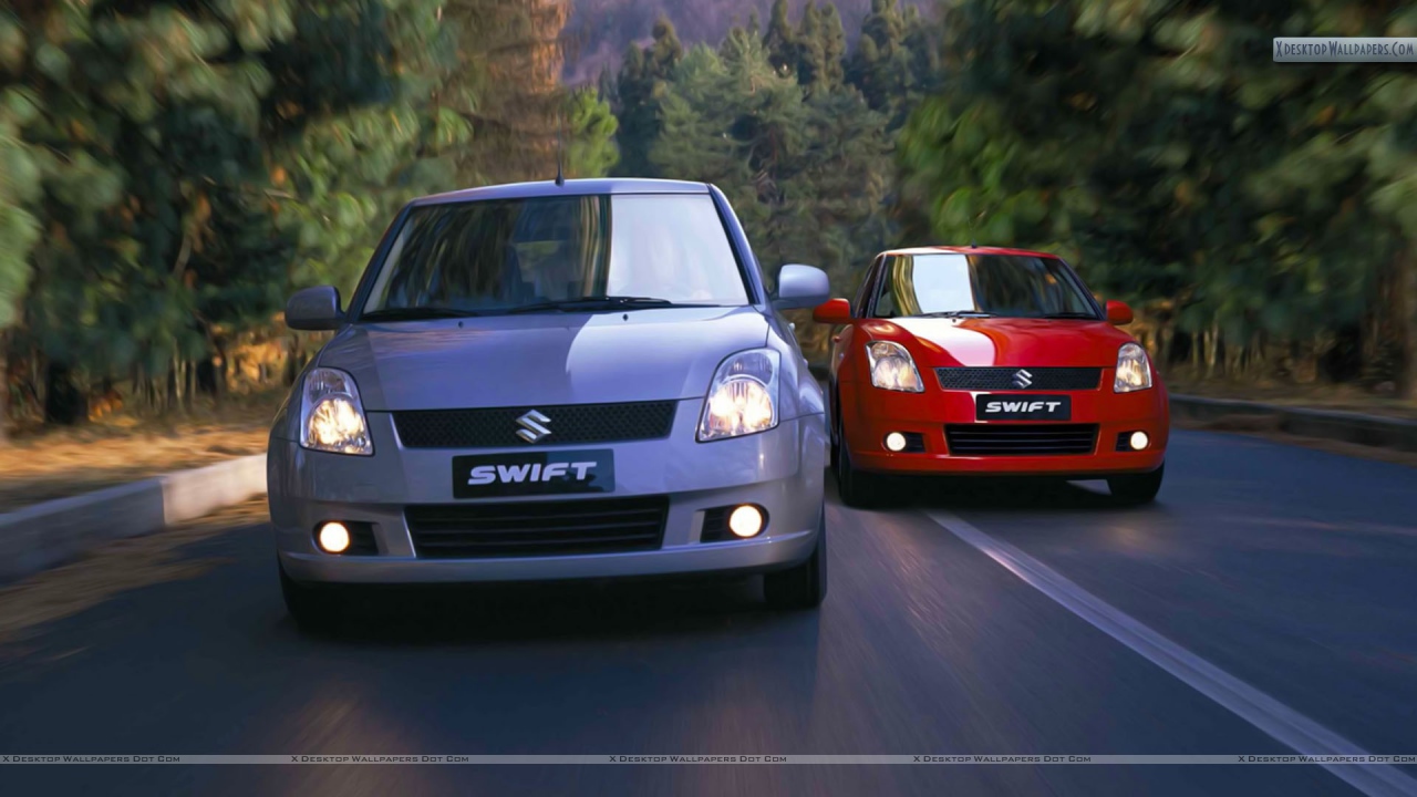 Автомобиль Suzuki Swift на дороге