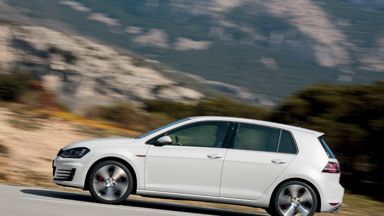 Фото автомобиля Golf GTI 2014 года