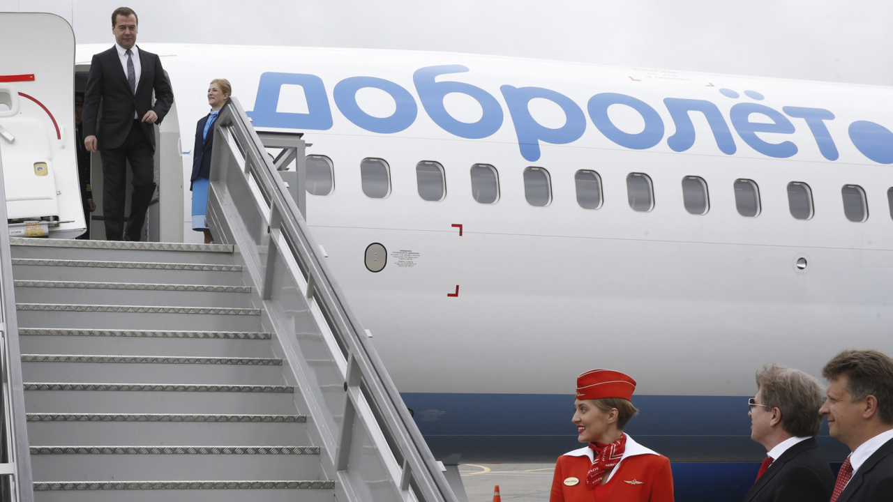 Medvedev on the airplane stairs Dobrolet