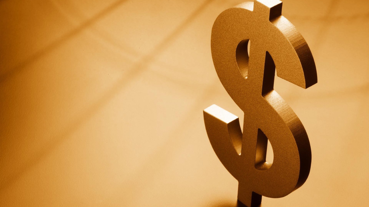 Металлический знак доллара