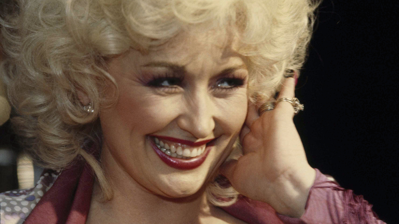 Супермодель Долли Партон