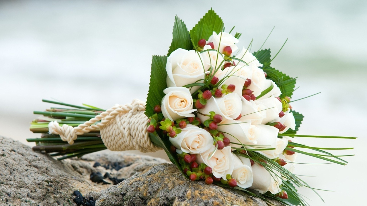 White roses in a wedding bouquet