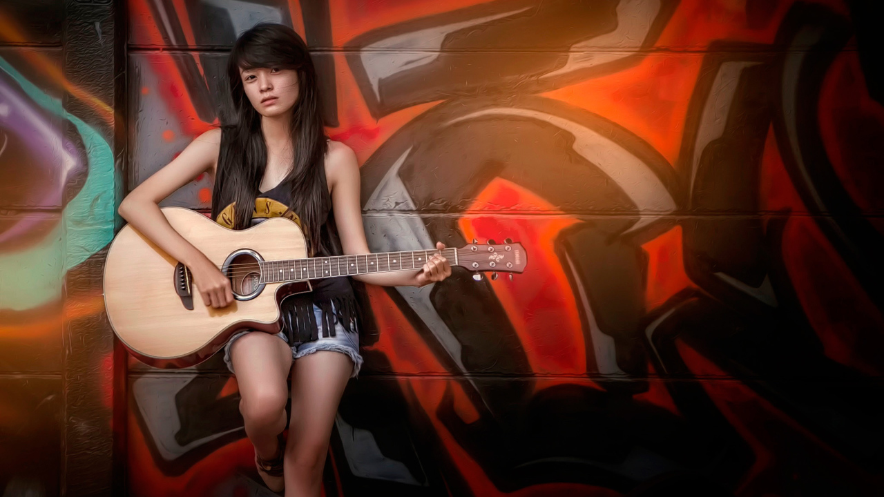 Японка с гитарой
