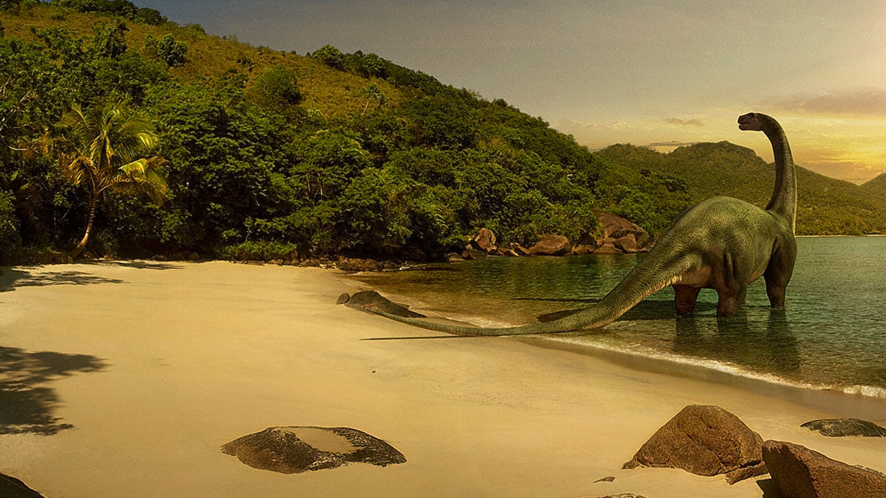 Динозавр на пляже