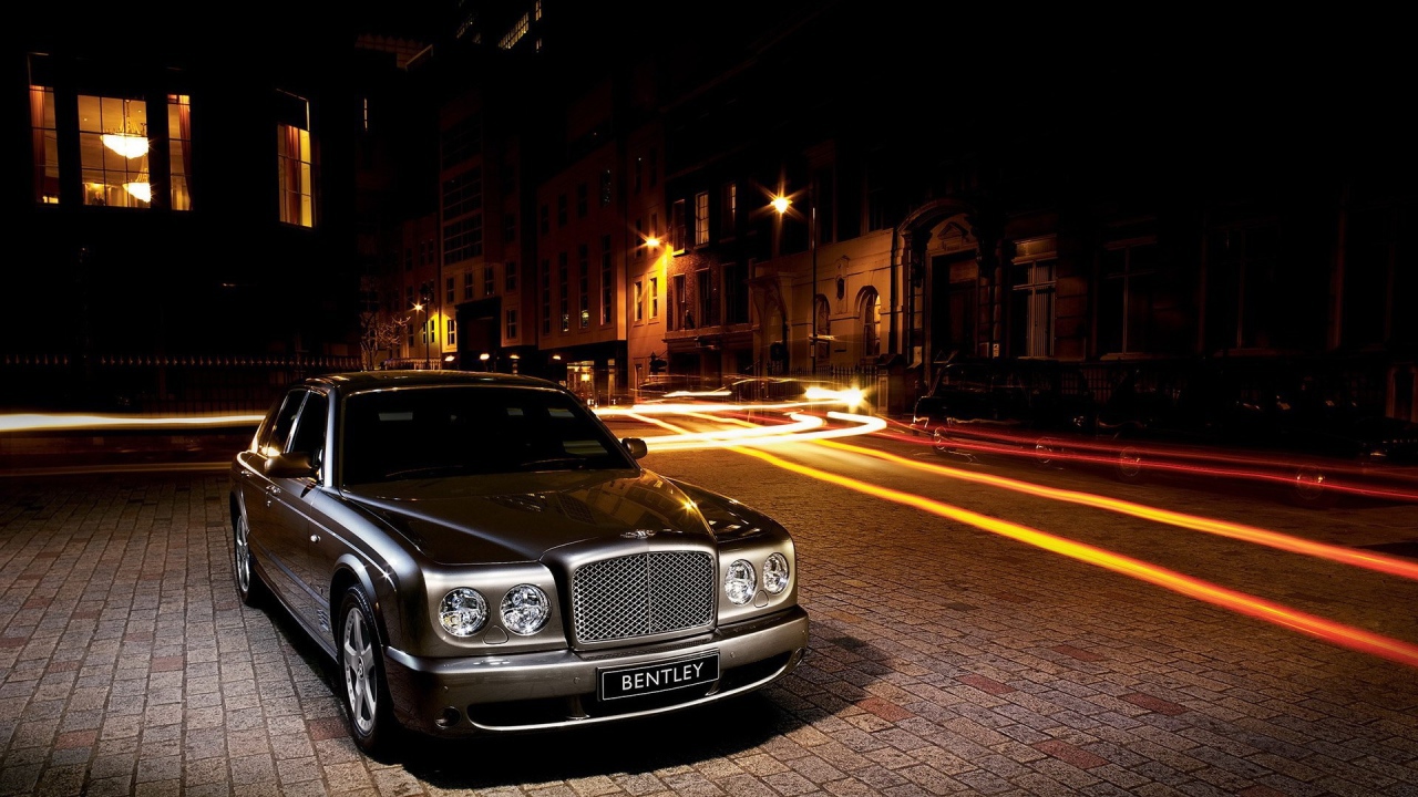 Bentley on a dark street