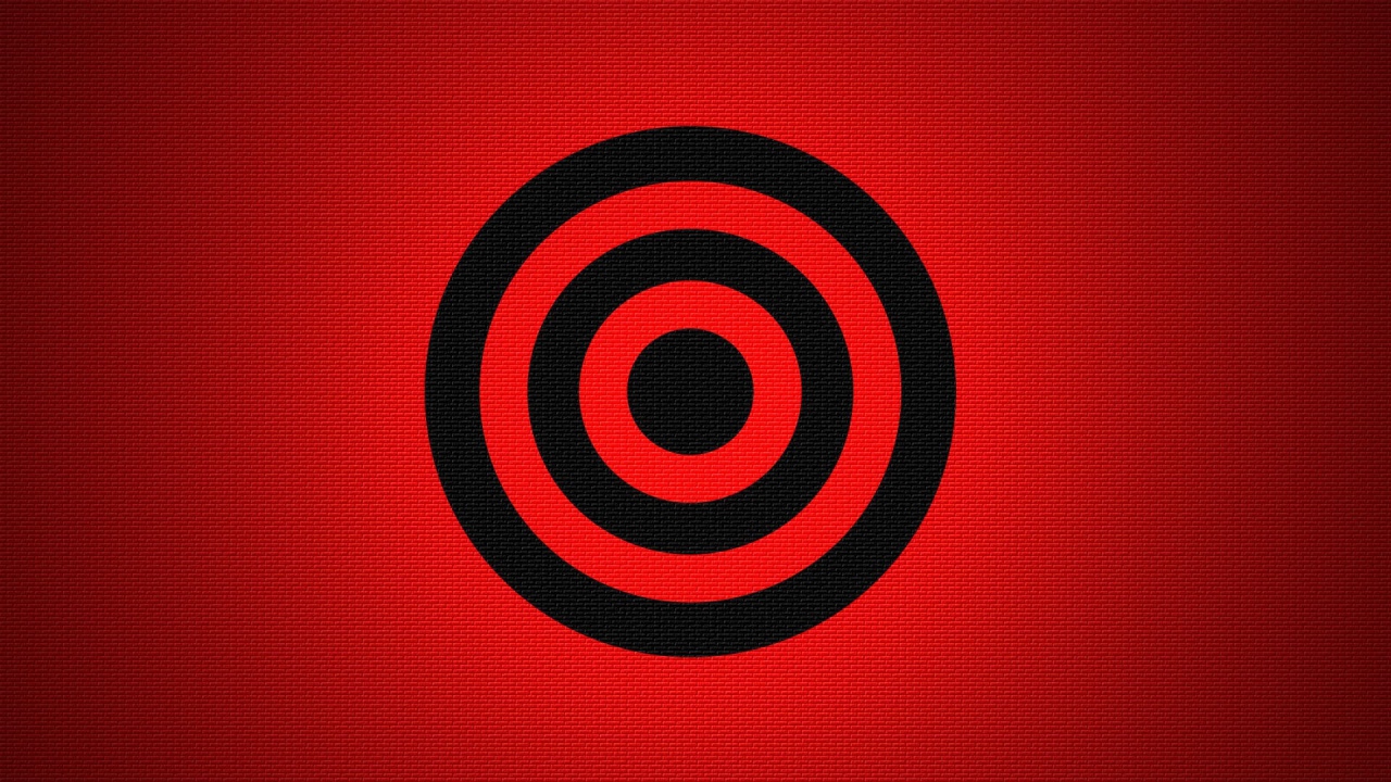 Черная мишень на красном фоне