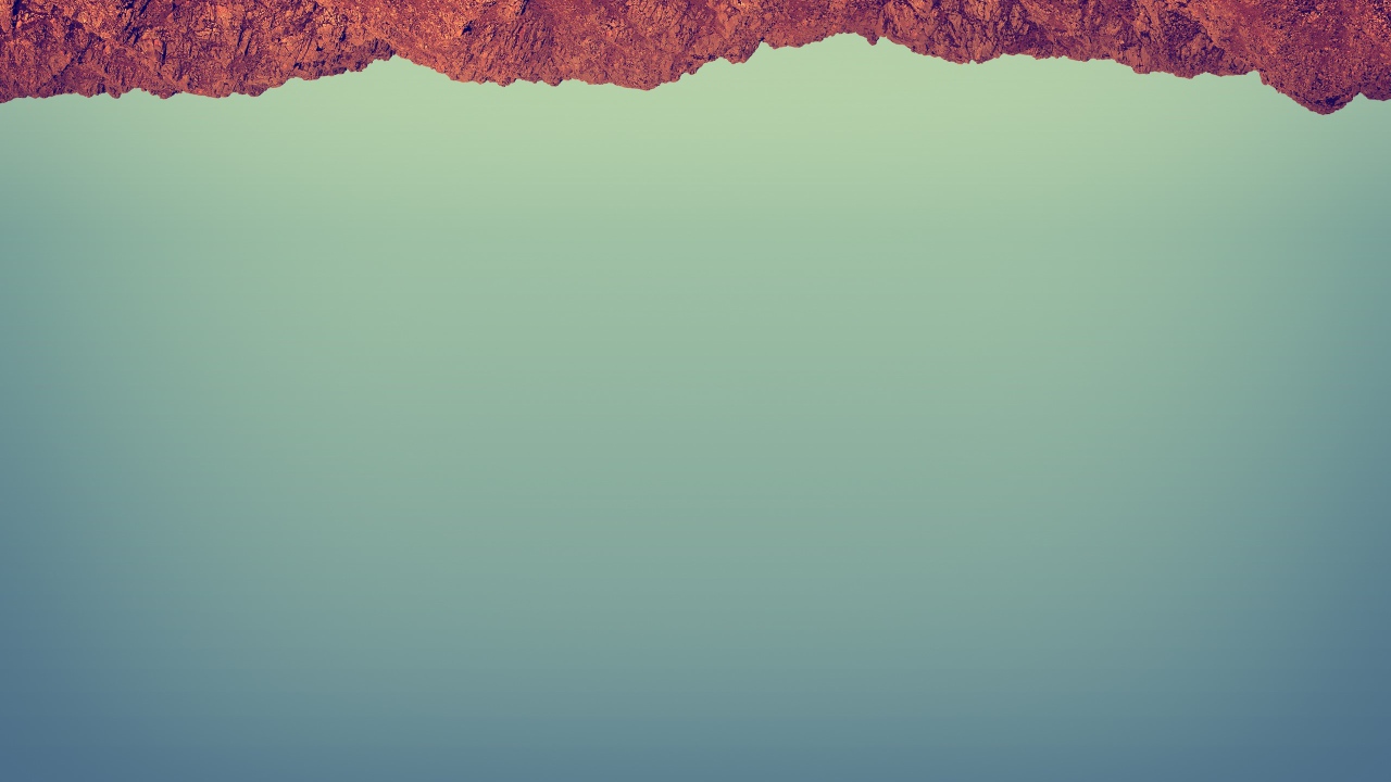 Красный камень на сером фоне