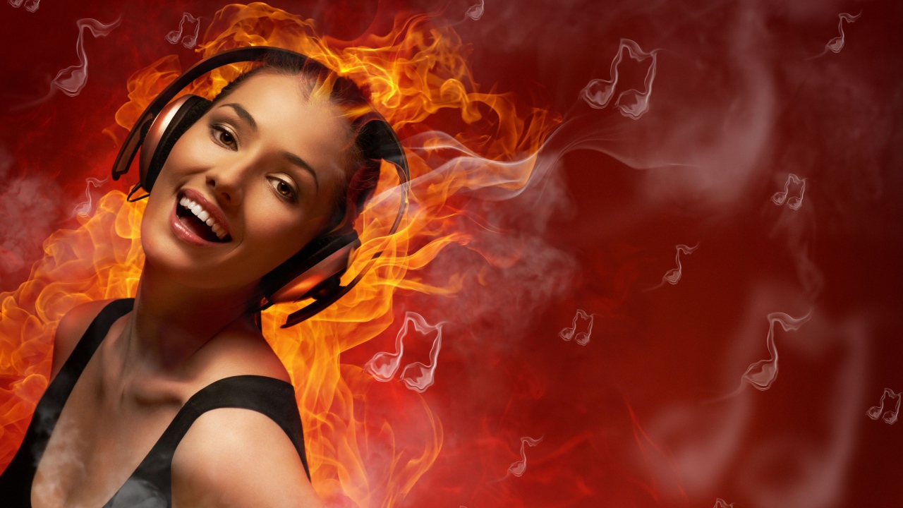 Девушка в огне слушает музыку