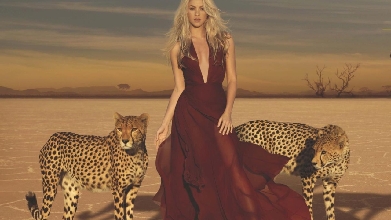 Shakira in red dress with leopard