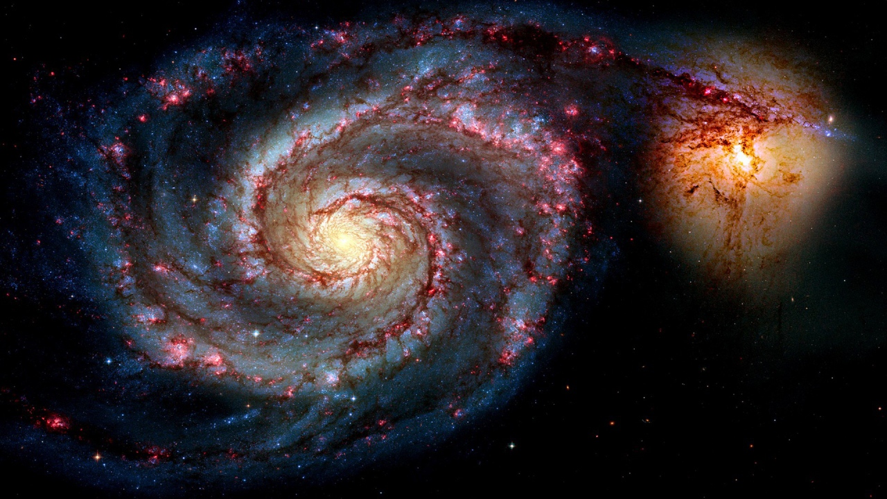 Слияние галактик в космосе