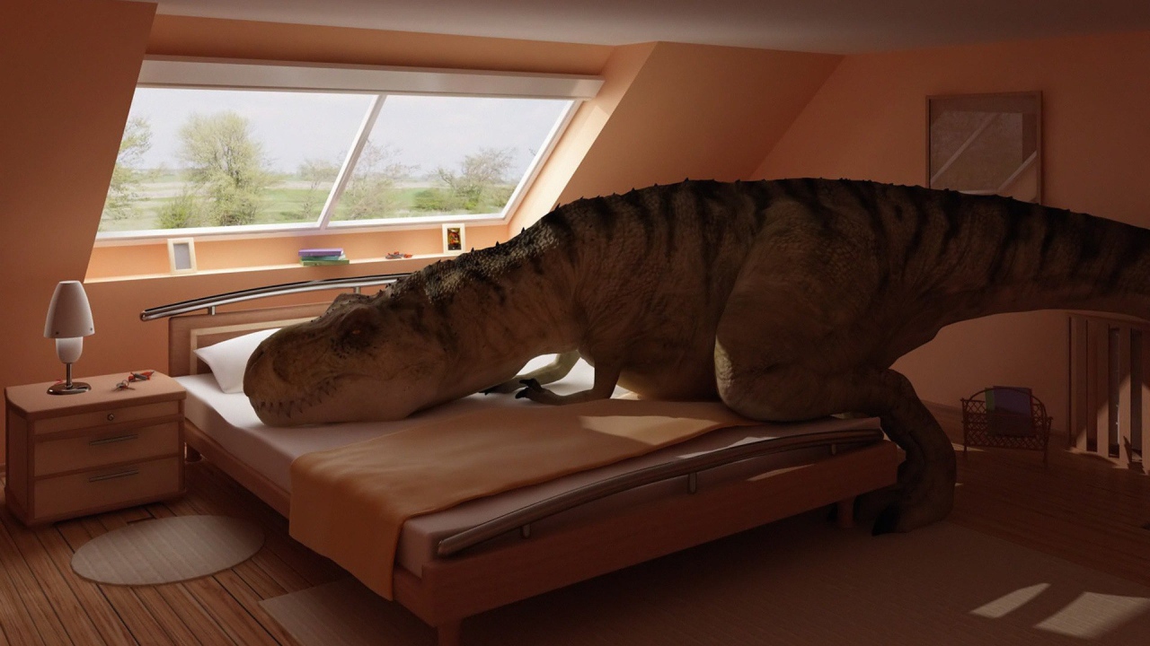Динозавр прилег на кровать