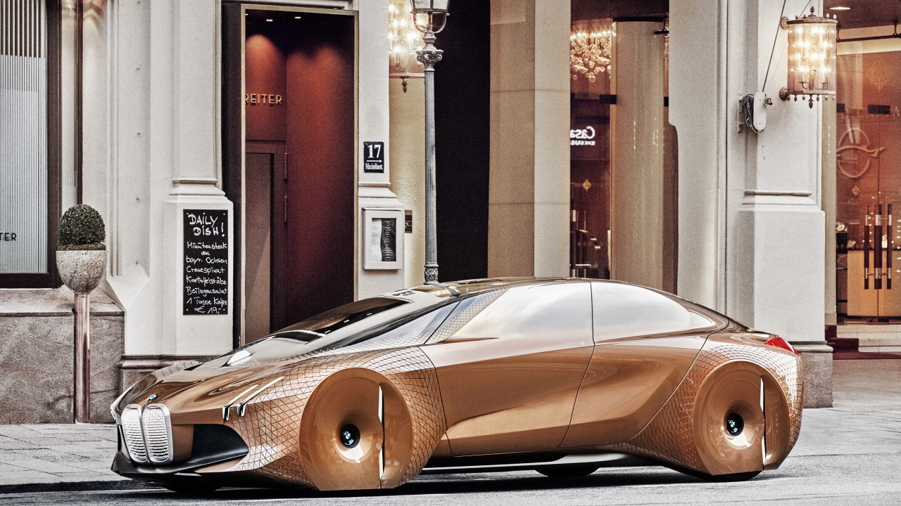 Коричневый стильный автомобиль BMW Concept Vision Next 100