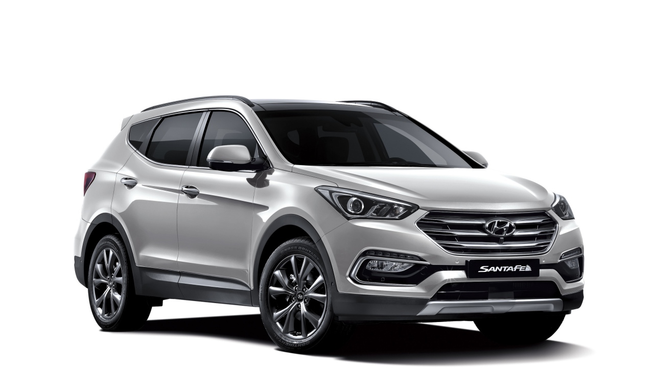Серебристый автомобиль Hyundai Santa Fe  на белом фоне