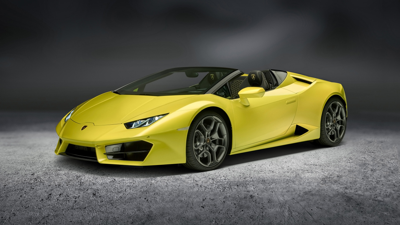 Желтый автомобиль кабриолет Lamborghini Huracan