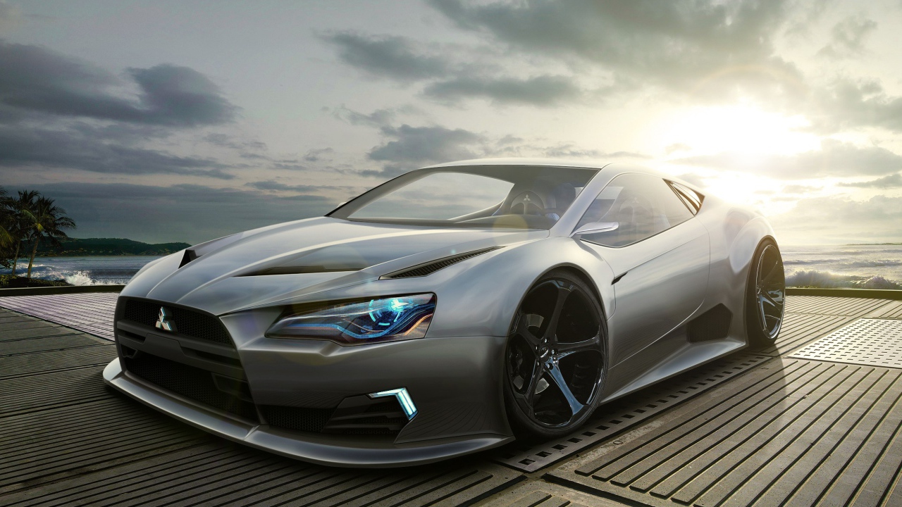 Серебристый автомобиль Mitsubishi в лучах солнца 