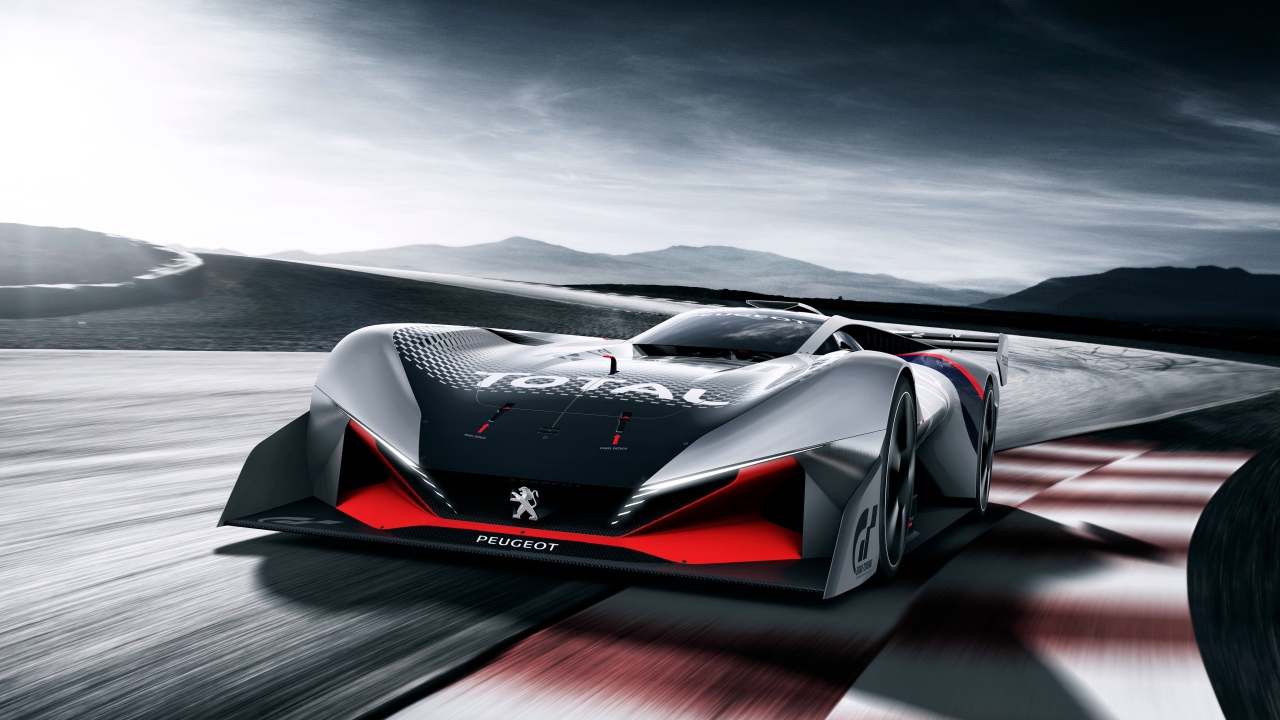 Гоночный автомобиль Peugeot L750 R Hybrid Vision Gran Turismo на трассе