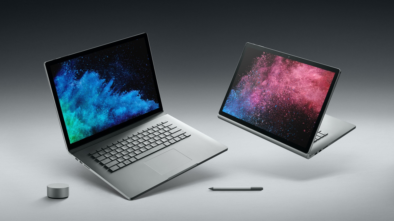 Стильные  ноутбуки Microsoft Surface Book 2, 2017 на сером фоне