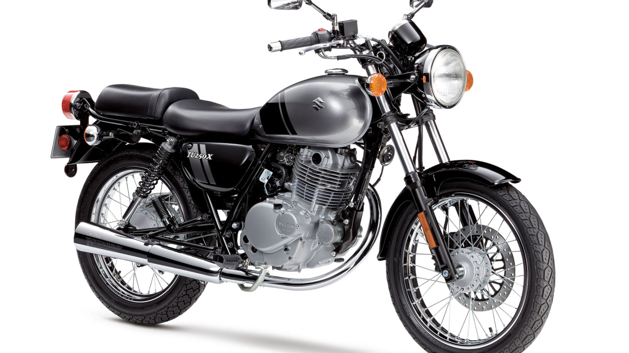 Мотоцикл Suzuki TU250X  на белом фоне 
