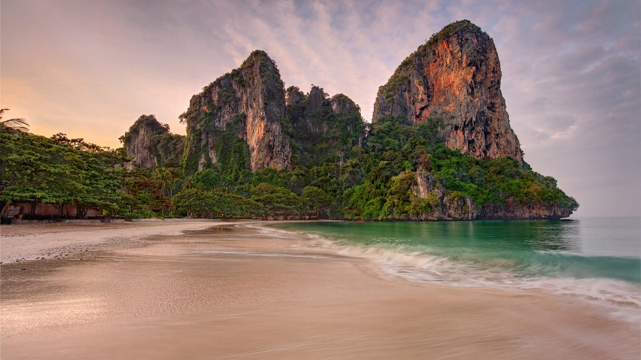 Covered with greenery rocks on the ocean, Thailand