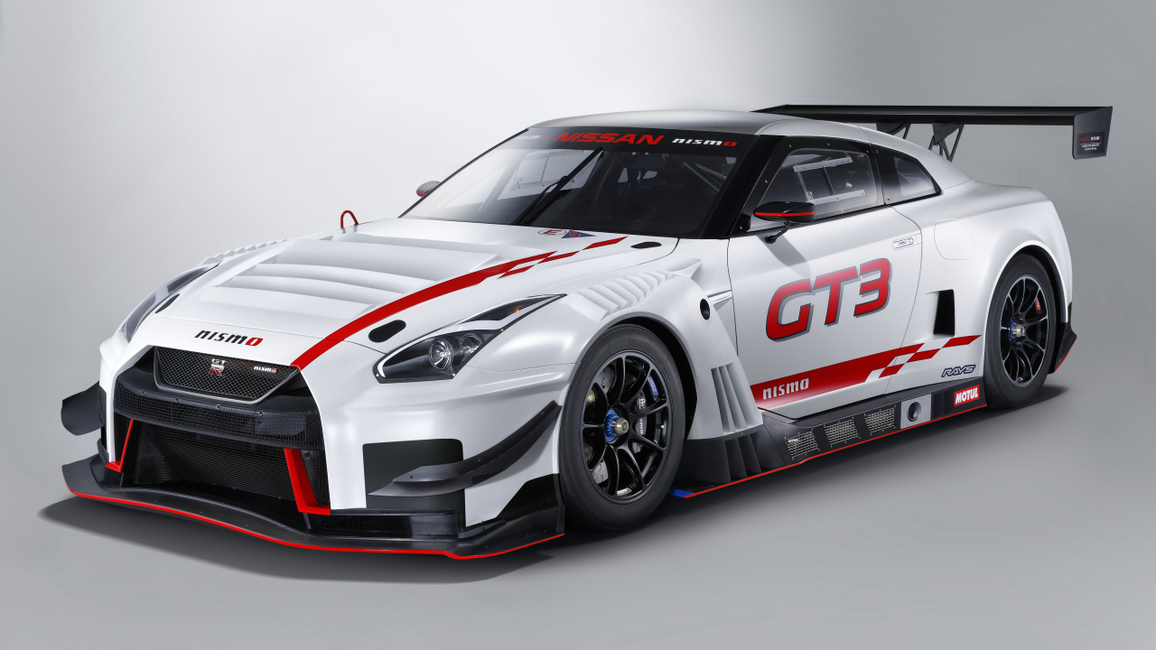 Спортивный автомобиль Nissan GT-R Nismo GT3, 2018 на сером фоне