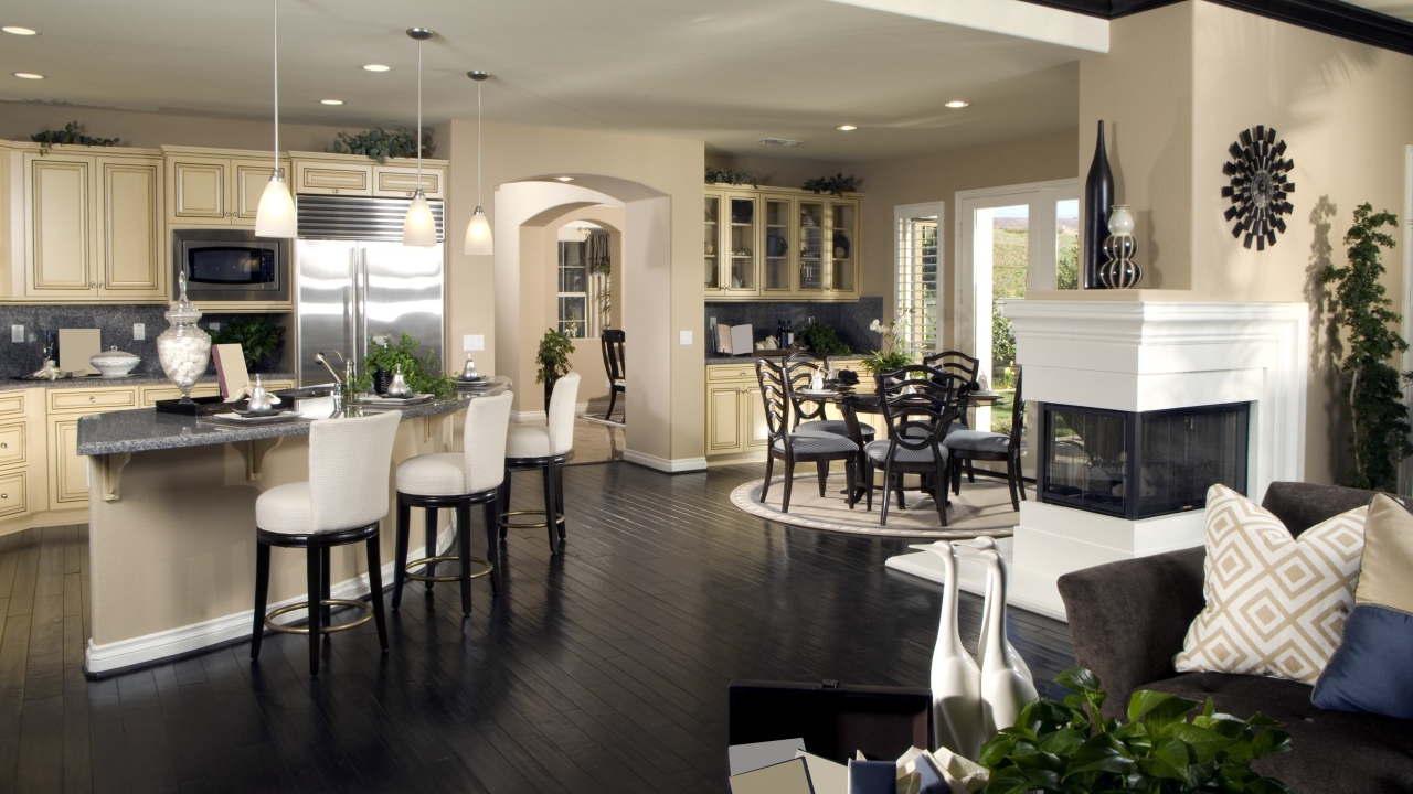 Красивая гостинная с кухней в пастельных тонах 