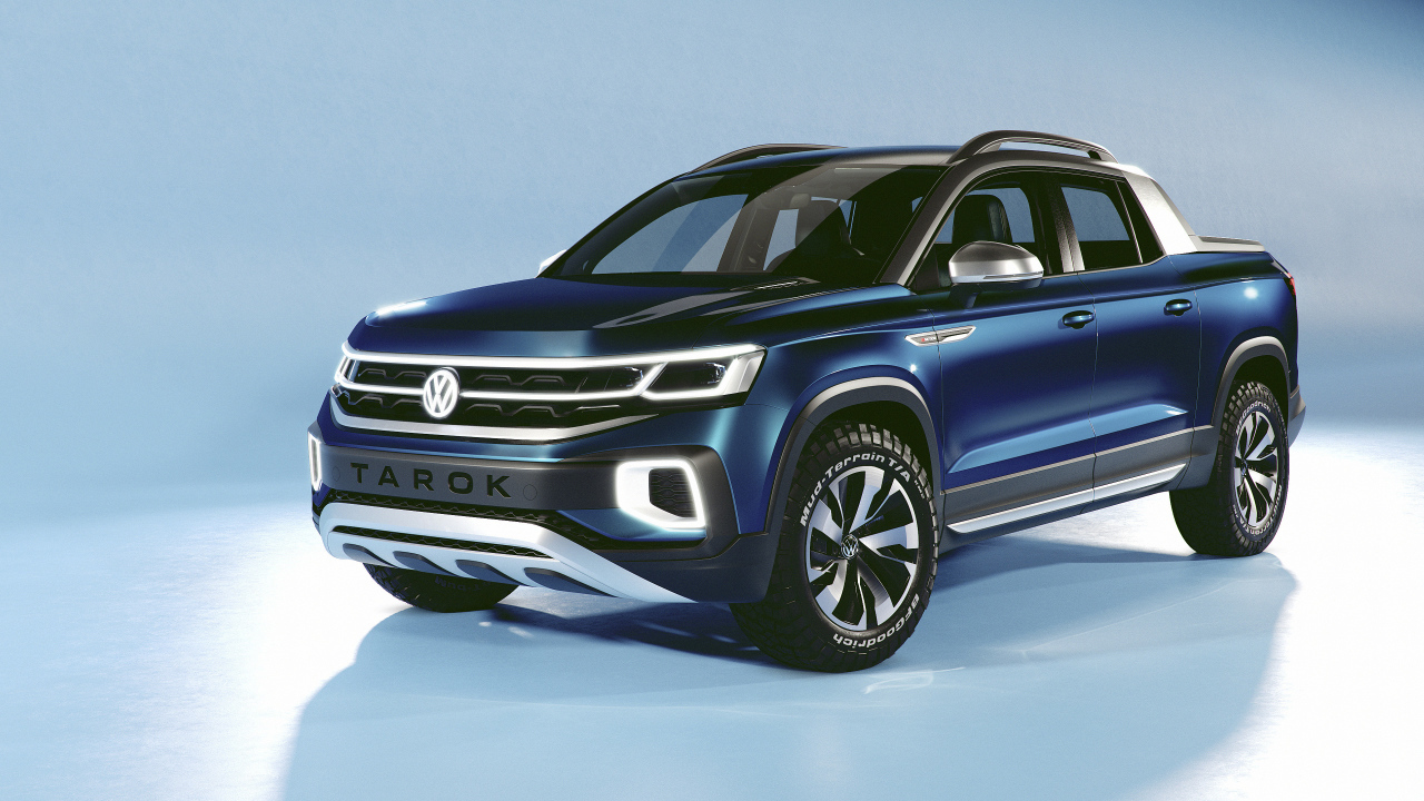 Синий внедорожник Volkswagen Tarok Concept 2019 года на голубом фоне