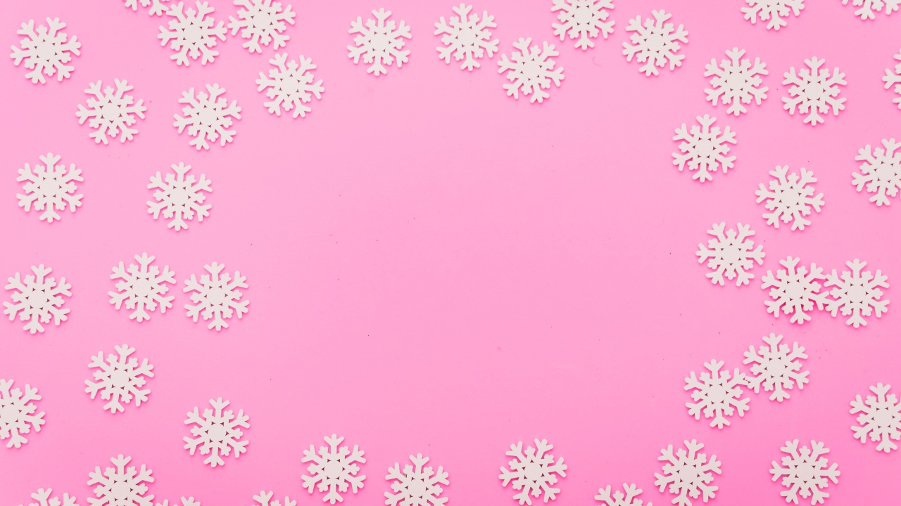 Много белых снежинок на розовом фоне