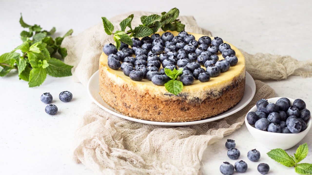 Appetizing tasty pie with blueberries and mint