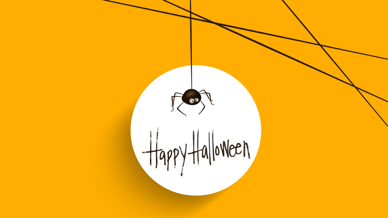 Белый круг с пауком и надписью на оранжевом фоне на Хэллоуин