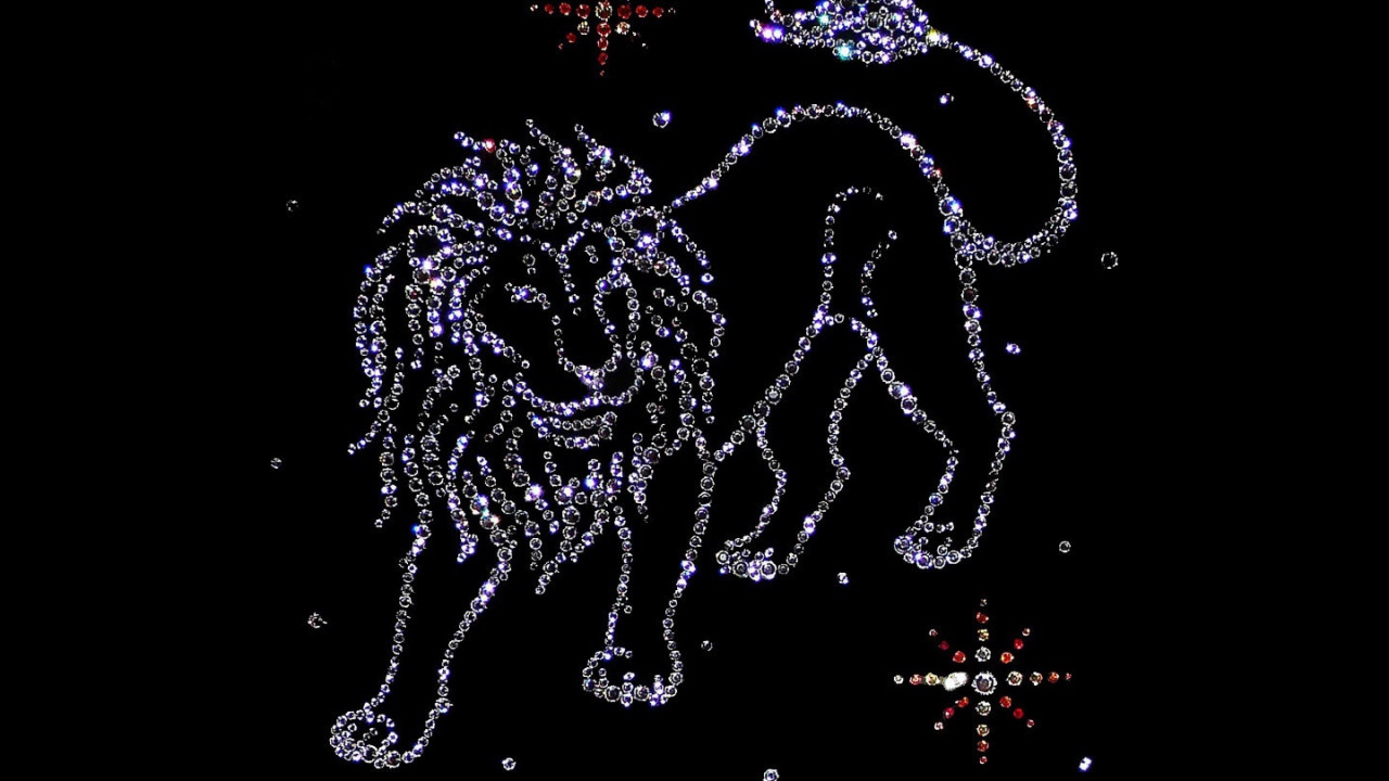Блестящий знак зодиака лев на черном фоне