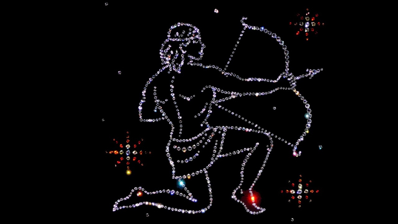 Блестящий знак зодиака стрелец на черном фоне