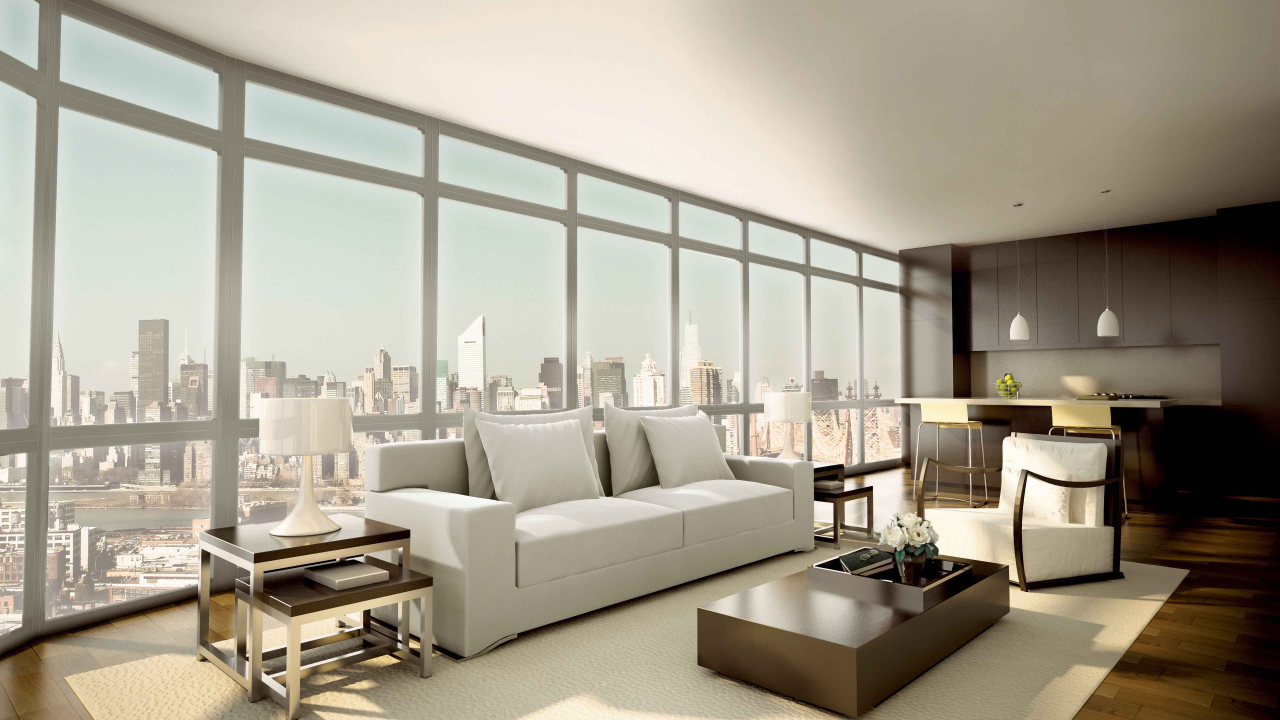 Белый диван у большого окна в гостиной комнате