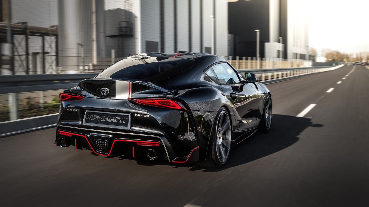 Черный Manhart Supra GR 450 2020 года на дороге вид сзади