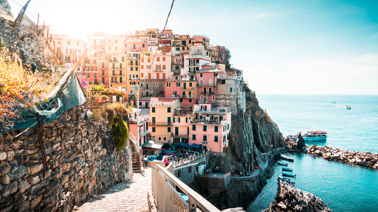 Houses in the city on a cliff by the ocean, Italy