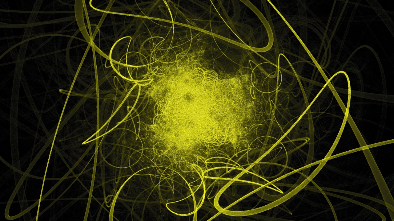 Яркие желтые волнистые лучи света на черном фоне